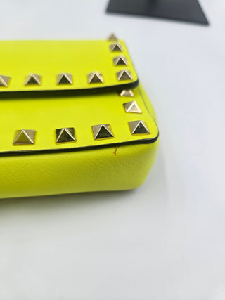 Valentino Garavani Neon Yellow Rockstud Bracelet Clutch
