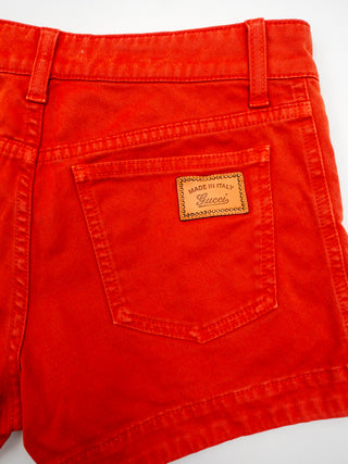 Orange Cotton Denim Mini Shorts with Zip-up Side Pockets in Gold Tone Hardware