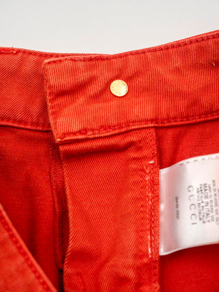 Orange Cotton Denim Mini Shorts with Zip-up Side Pockets in Gold Tone Hardware