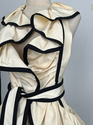 Beige Top With Black Trim And Matching Belt