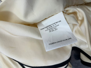Beige Top With Black Trim And Matching Belt
