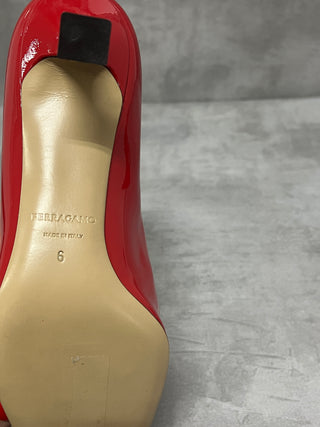 Red "Annie" Bow-Embellished Patent Pumps