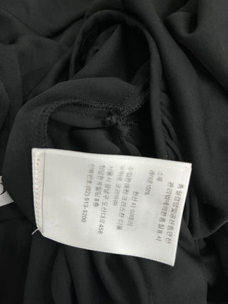 Black Jumpsuit With Open V And Elastic Waistline