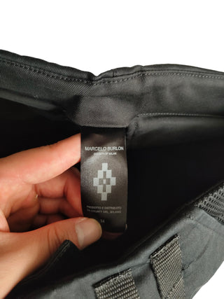 BLACK PANTS WITH SIDE POCKETS AND DOUBLE ZIPS END