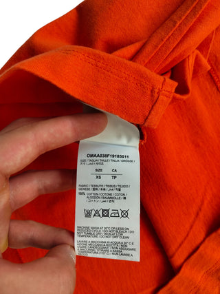 Orange Tee With Black Stitching Logo At The Back
