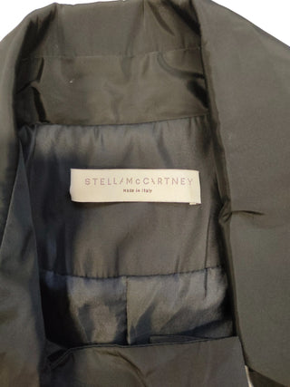 Black Trench Coat With Beige Print At The Bottom And A Matching Belt Strap