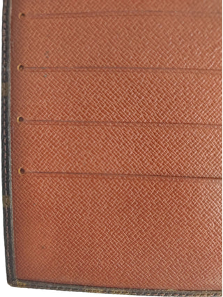 Monogram Canvas Pochette Passport Trifold Wallet