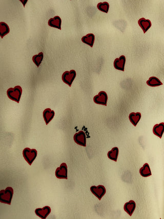 Beige Dress With Overall Heart Shaped Pattern And Open Back