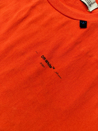 Orange Tee With Black Stitching Logo At The Back