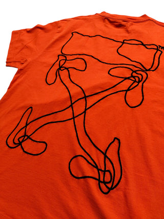 Orange Tee With Black Stitching Logo At The Back