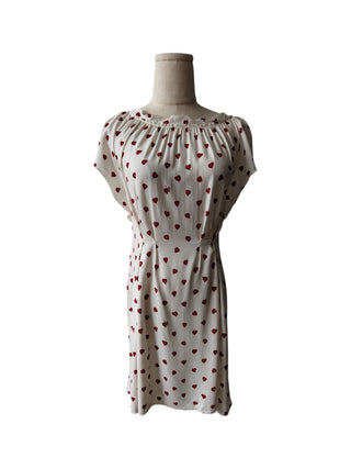 Beige Dress With Overall Heart Shaped Pattern And Open Back