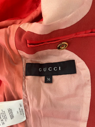 Orange Jacket With Gold Buttons