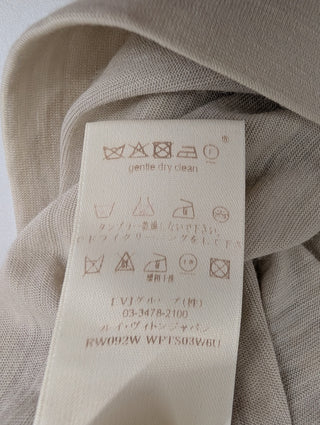 Beige Wool Top With Braided Neck And Logo Embellishment