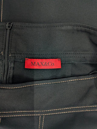 Black Skirt With Beige Stitching And Side Slits