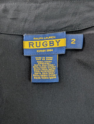 Black Sleeveless Top With Tie And Diamante Buttons