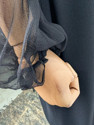 Black Dress With Sheer Sleeves And Ribbon At The Front
