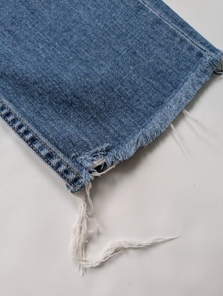Blue Jeans With Ripped Ends