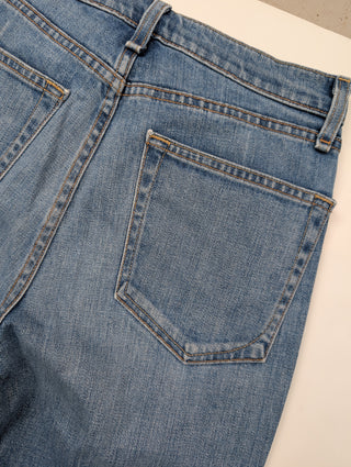 Blue Jeans With Ripped Ends