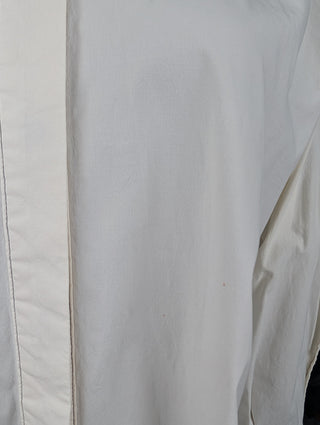 White Shirt With Black Stitching On Seams