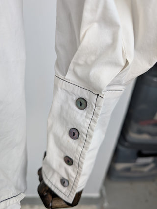 White Shirt With Black Stitching On Seams