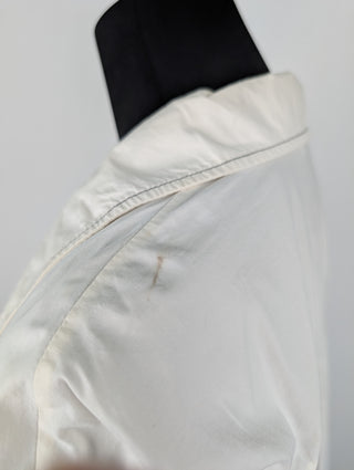 White Shirt With Black Stitching On Seams