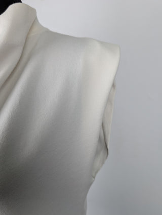 Cream Sleeveless Top With Dropping Neck Line