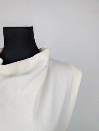 Cream Sleeveless Top With Dropping Neck Line