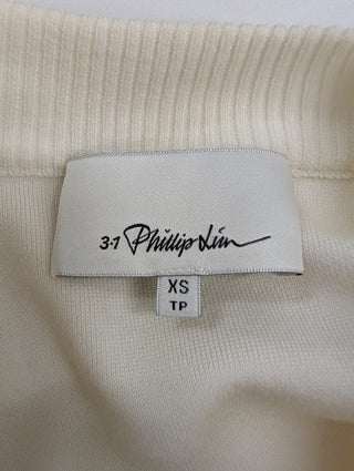 Cream Sleeveless Top With Dropping Neck Line