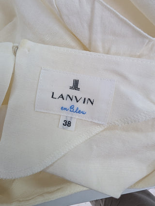 White Top With Ruffle Shoulders