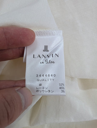 White Top With Ruffle Shoulders