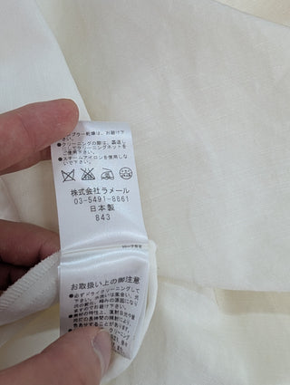 White Top With Ruffle Shoulders