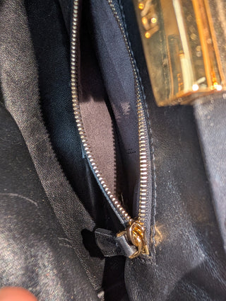 Brown And Black Peekaboo Leather Handbag With Tabs