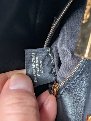 Brown And Black Peekaboo Leather Handbag With Tabs