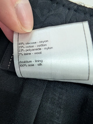 Black And White Tweed Jacket With "CC" Logo Buttons And Silver Chain Inside