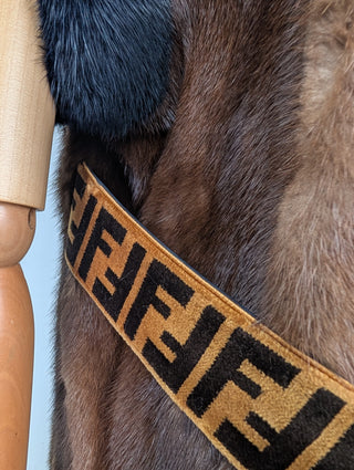 Brown Fur Vest With Blue Fur Frims And Logo Back Belt