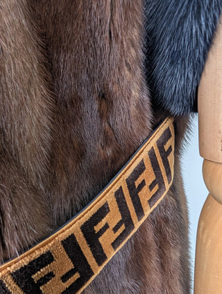 Brown Fur Vest With Blue Fur Frims And Logo Back Belt
