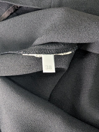 Black Sleeveless Top With Ruffles Shoulders