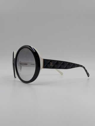 Black Round Sunglasses With Quilted "Matelasse" On The Side Arms And Inner White Contrast