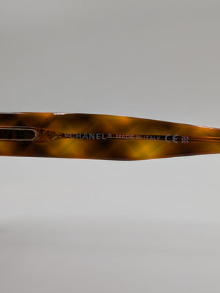 Brown Tortoise Round Sunglasses With Quilted Arms And Small Interlocking CC Logo On Side Arms