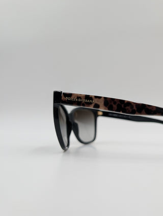 Black Oversized Cat-Eye Sunglasses Features Leopard-Print On The Arms