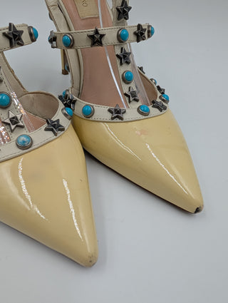 Yellow Rockstud Accents Patent Leather T-Strap Pumps