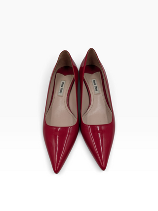 Red Patent Leather Point-Toe Heels With Bedazzled Sole