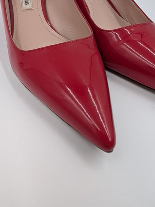 Red Patent Leather Point-Toe Heels With Bedazzled Sole