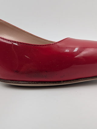 Red Patent Leather Point-Toe Heels With Bedazzled Sole