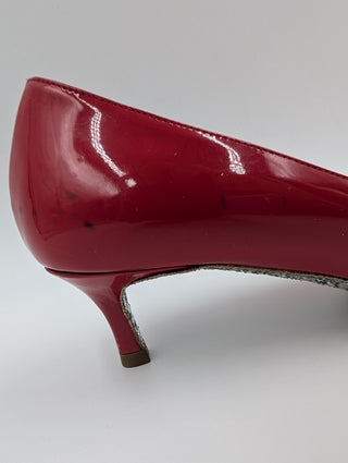 Red Patent Leather Point-Toe Heels With Bedazzled Sole