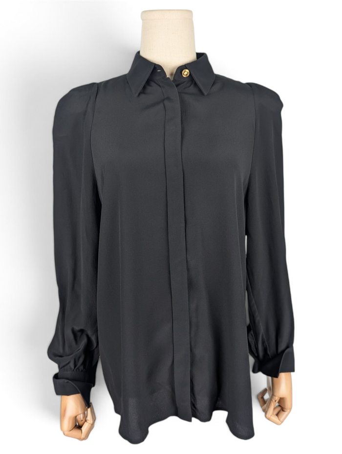 Black Button Up Top With Shoulder Pads And Gold Button At Top