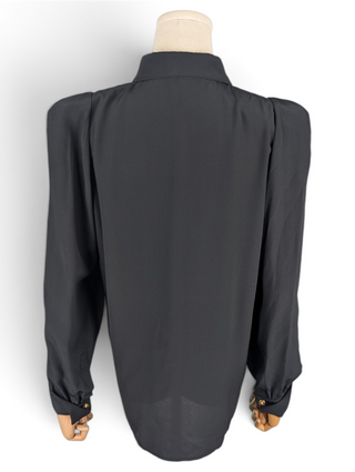 Black Button Up Top With Shoulder Pads And Gold Button At Top