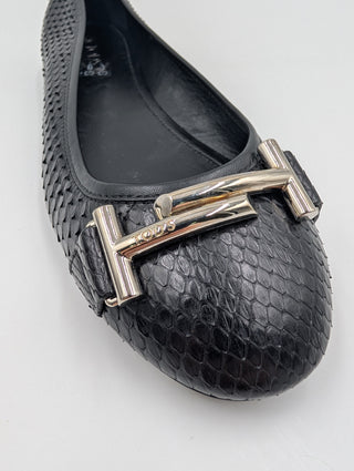 Black Snakeskin Flats With Metal Logo Details