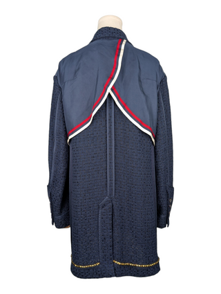 Now From Then Undercover navy cotton oversized jacket with inside-out design, striped tape detail, and gold hem studs.